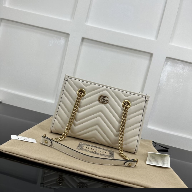 G*u*i top handle bags